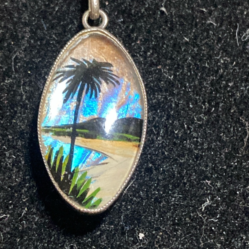 Sterling Thomas L Mott butterfly wing pendant with chain.